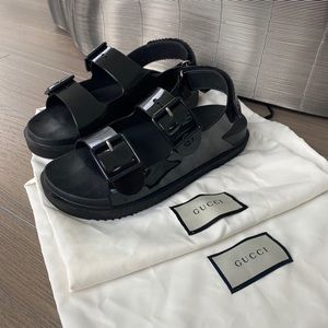 Gucci Sandals with mini Double G in black rubber.